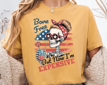 Camiseta divertida patriótica del 4 de julio con el lema "Nacido libre, pero ahora soy caro" (Esqueleto),