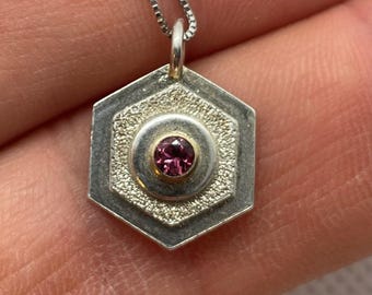Pendant with natural imperial garnet