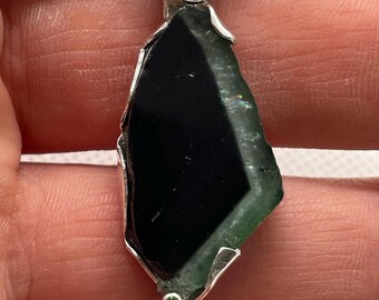 Pendant with natural tourmaline slice and garnet