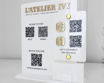 Kod QR do salonu z logo w kolorze złotego lustra i ikonami mediów społecznościowych – biały akrylowy wyświetlacz biznesowy i uchwyt na karty