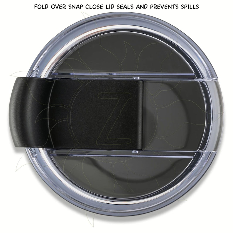 May include: A clear plastic lid with a black snap closure. The lid has a dark interior and a black clasp with the letter "Z". The text "FOLD OVER SNAP CLOSE LID SEALS AND PREVENTS SPILLS" is visible.