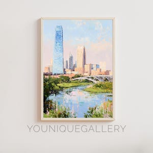 Puede incluir: Una pintura de un paisaje urbano con un río en primer plano. Los edificios están pintados en tonos de azul, rosa y blanco. El río es de color azul claro y hay árboles y arbustos a lo largo de las orillas.