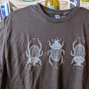 Beetle blockprint t-shirt with white ink | entymology/bug-themed lino print clothing