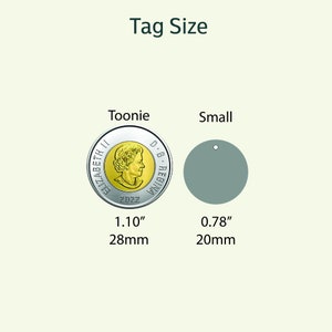 May include: A comparison of two different tag sizes. The larger tag is 1.10 inches or 28 mm in diameter and is labelled "Toonie". The smaller tag is 0.78 inches or 20 mm in diameter and is labelled "Small".