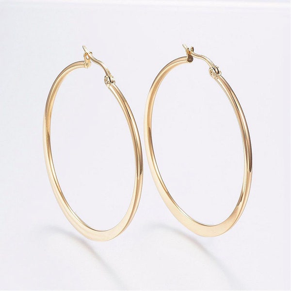 304 Stainless Steel Hoop Earrings, Hypoallergenic Earrings. Medium Earrings. 44 mm in diameter. Gold color. Flat Ring Shape.