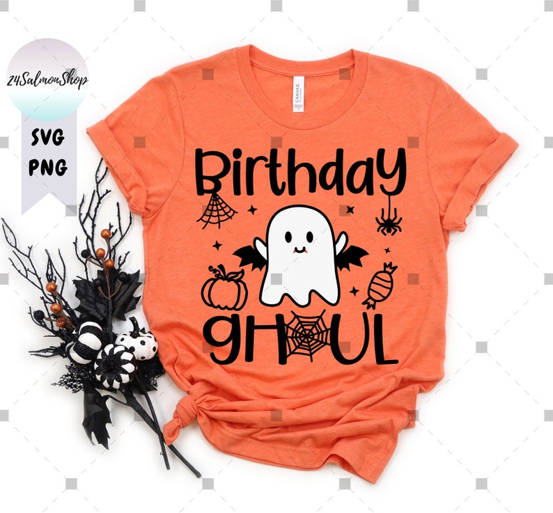 May include: Orange t-shirt with a black and white graphic of a ghost with wings and the text "Birthday Ghoul".