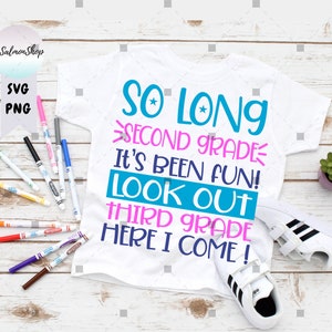 May include: White t-shirt with blue, pink, and black text that reads "So Long Second Grade It's Been Fun! Look Out Third Grade Here I Come!"