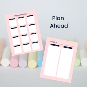 May include: Two pink paper sheets with the text "Important Dates" and "Plan Ahead". The first sheet has a calendar layout with months listed. The second sheet has sections for "Focus" and "Goals". The background has colourful chalk.