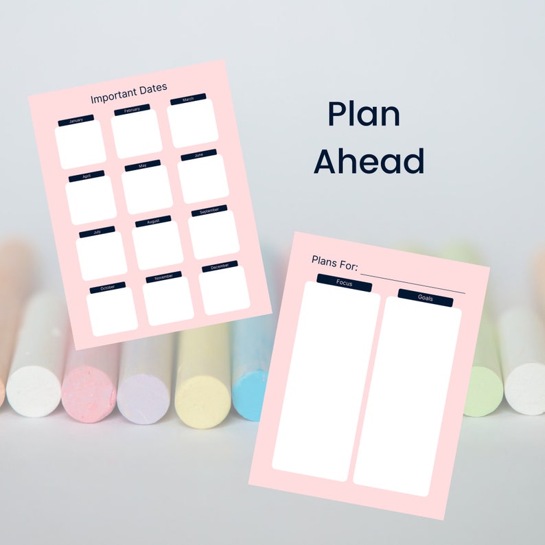 May include: Two pink paper sheets with the text "Important Dates" and "Plan Ahead". The first sheet has a calendar layout with months listed. The second sheet has sections for "Focus" and "Goals". The background has colourful chalk.