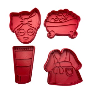 May include: Set of four red plastic cookie cutters shaped like a woman with a bow in her hair, a bathtub with bubbles and hearts, a tube of lotion, and a bathrobe with a heart on the pocket.