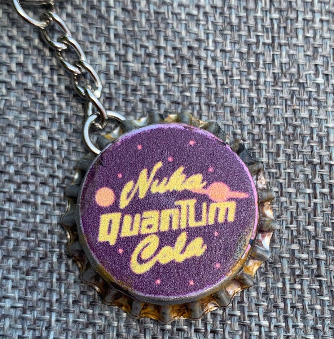 Nuka Quantum Cola bottle cap keychain inspired from Fallout Etsy