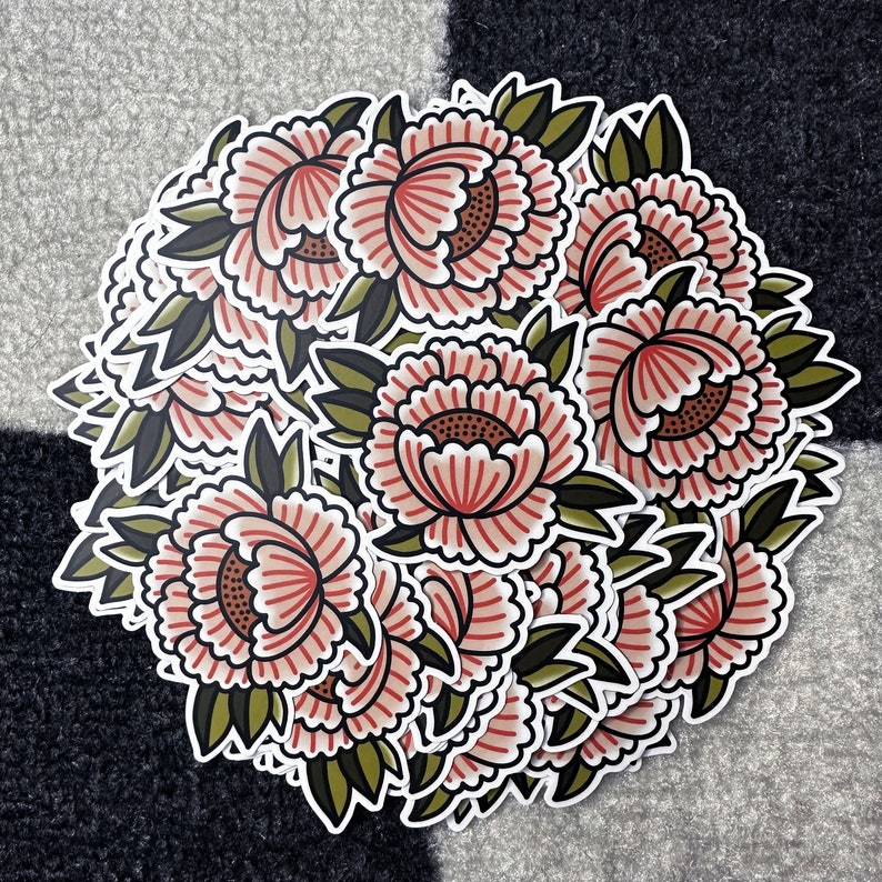 May include: A collection of floral stickers featuring pink and green flowers with intricate details. The stickers are arranged in a circular pattern, creating a visually appealing design.
