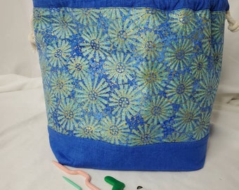 Drawstring project bag for knitting and crocheting.