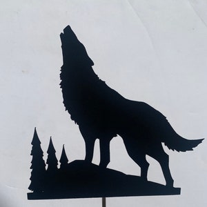 May include: Black silhouette of a wolf howling at the moon, standing on a base with three small trees. The wolf is facing the left side of the image.