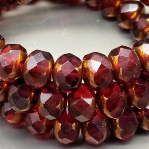 10 Bohemian glass beads 6 x 9 mm - fire-polished rondelle - transparent garnet with bronze - faceted - Czech beads - Boho