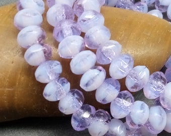 30 rare Bohemian rondelles 3 x 5 mm - a whole strand! - Combination of milky lavender and transparent lavender - faceted - glass beads