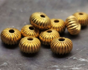 8 gerillte Rondelle 10x6 mm - Goldfarben - Legierung - Hohl - Spacer - Ethno - Zwischenperlen - Großloch - M_40