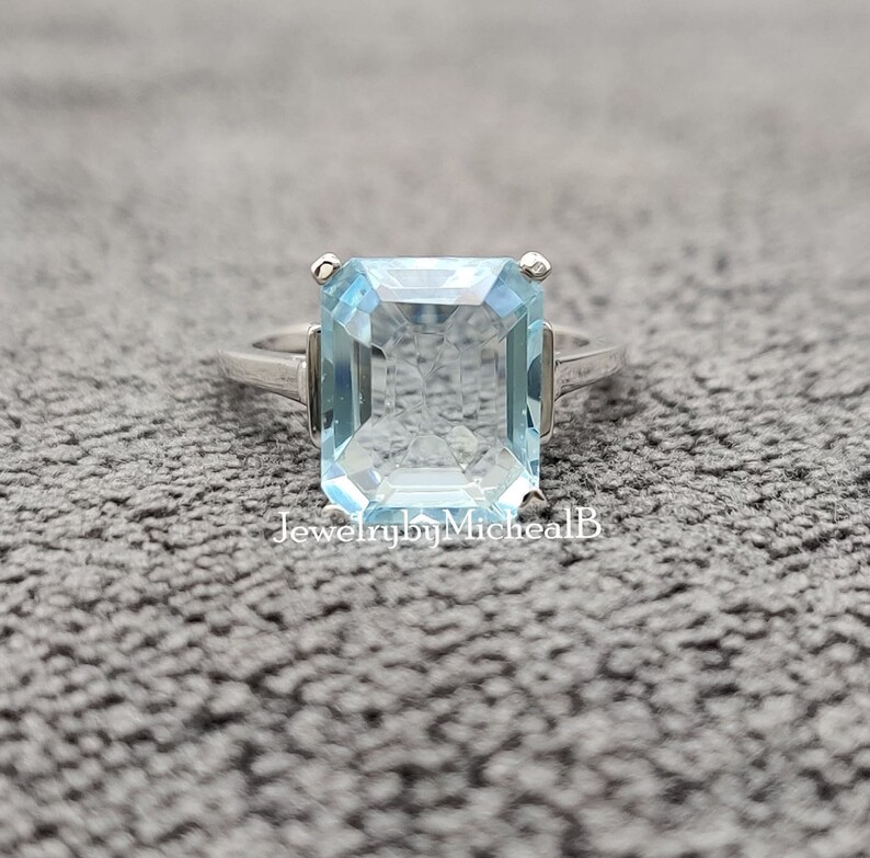 Details about Women's Solitaire Ring 4 ct Emerald Cut Aquamarine 14k White Gold Over Silver Details about Women's Solitaire Ring 4 ct Emerald Cut Aquamarine 14k White Gold Over Silver