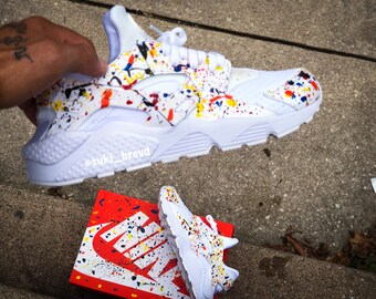 white huaraches with paint splatter