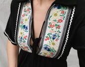 70s vintage dress with the cutest embroidered floral panels and a unique lattice bust