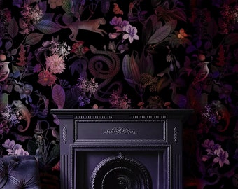 May include: A dark purple velvet armchair sits in front of a black fireplace with a dark floral wallpaper featuring snakes, birds, and flowers.