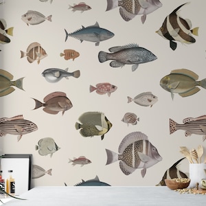 May include: A white background wallpaper with a repeating pattern of various colorful fish illustrations. The fish are drawn in a vintage style and include a pufferfish, a tuna, a striped fish, and a butterfly fish.