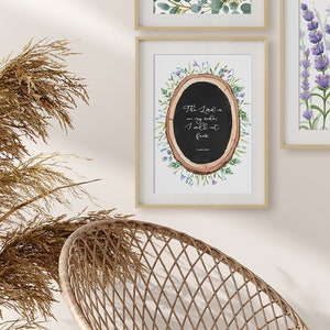 May include: A framed print featuring a watercolour illustration of a tree stump with a black chalkboard inside. The chalkboard displays the text "The Lord is my shepherd; I will not fear" and "Psalm 23:4". The tree stump is encircled by watercolour flowers and leaves.