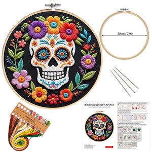 May include: An embroidery DIY art kit featuring a Day of the Dead skull design. The skull is surrounded by colorful flowers in a black hoop. The kit includes embroidery floss, needles, and a 7.9-inch (20cm) hoop.