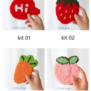 May include: Four DIY punch needle kits featuring different designs: a red speech bubble with the word "Hi", a red strawberry, an orange carrot, and a pink peach. Each kit includes yarn and a pre-punched canvas.