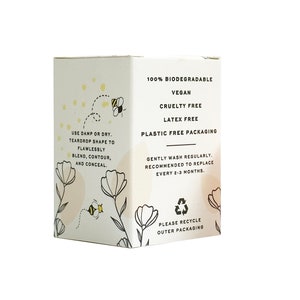 K&ouml;nnte beinhalten: Eine wei&szlig;e Box mit einem Bienen- und Blumendesign. Die Box ist mit dem Text "100% biologisch abbaubar", "Vegan", "Tierversuchsfrei", "Latexfrei", "Verpackung ohne Plastik", "Regelm&auml;&szlig;ig mit Wasser waschen. Austausch alle 2-3 Monate empfohlen." und "Bitte recyceln Sie die Au&szlig;enverpackung" beschriftet.