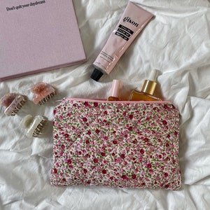 Trousse de maquillage florale rose et rouge