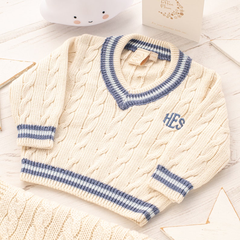 Personalised Cream Baby Cricket Jumper with Dark Blue and Pale Blue Stripes image 1