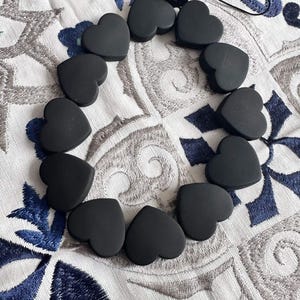 Heart phone charms in black colour.  Mobile phone charms, mobile phone chain accessory.  Black heart phone strap.
