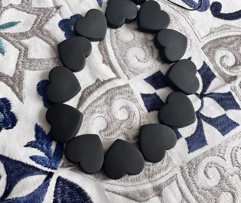 Heart phone charms in black colour.  Mobile phone charms, mobile phone chain accessory.  Black heart phone strap.
