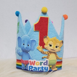 May include: Blue felt crown with a rainbow trim, featuring a red felt number one, a cartoon elephant, and a cartoon cheetah. The crown has the words "Word Party" printed on the front.