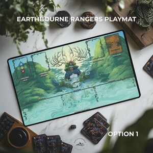 May include: A rectangular Earthborne Rangers playmat with a fantasy landscape design. The mat features a central figure with antlers and floral headwear, surrounded by water and greenery. The text "EARTHBOURNE RANGERS PLAYMAT" is at the top. Several game cards and dice are also visible.