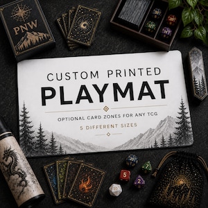 May include: A rectangular white playmat featuring a black mountain and forest landscape illustration with the text CUSTOM PRINTED PLAYMAT, OPTIONAL CARD ZONES FOR ANY TCG, and 5 DIFFERENT SIZES printed in black and gold lettering on the surface.