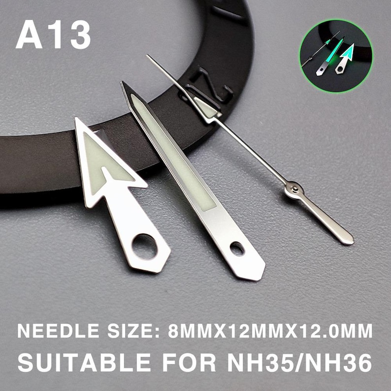 May include: Silver watch hands with luminous green accents. The set includes an arrow-shaped hour hand, a rectangular minute hand, and a slender second hand. The text "A13" is visible. The text "NEEDLE SIZE: 8MMX12MMX12.0MM SUITABLE FOR NH35/NH36" is also visible.