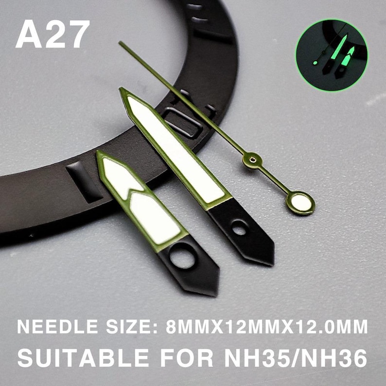 Op de afbeelding: Set wijzerplaten met een zwarte basis en groene en witte accenten. De set bevat uur-, minuten- en secondewijzers. De tekst "A27" is zichtbaar. De tekst "NEEDLE SIZE: 8MMX12MMX12.0MM SUITABLE FOR NH35/NH36" is ook zichtbaar.