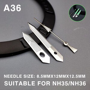 May include: Silver watch hands with white accents and a black watch band. The image includes the text "A36" and "NEEDLE SIZE: 8.5MMX12MMX12.5MM SUITABLE FOR NH35/NH36".