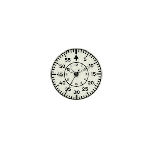 May include: A round clock face with a cream-coloured background and black markings. The outer ring displays minutes from 5 to 55 with an upward arrow at the top. The inner circle features hour numerals from 1 to 12. Three thin black hands indicate the time.
