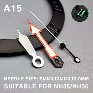 May include: A collection of watch hands in various styles. One hand is white with a rectangular shape, another is red with a white arrow design, and the third is black with a white circle. The text reads "A15" and "NEEDLE SIZE: 9MMX13MMX13.0MM SUITABLE FOR NH35/NH36".