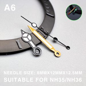 May include: Watch hands in various styles. The image shows a set of watch hands, including a gold-colored hand, a black hand with a white circle, and a black hand with a white and silver design. The text in the image reads "A6" and "NEEDLE SIZE: 8MMX12MMX12.5MM SUITABLE FOR NH35/NH36".