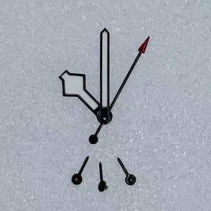 May include: Watch hands set. The set includes a white and black hour hand, a black minute hand, a black second hand with a red arrow tip, and three small black hands. The hands are designed for a watch.