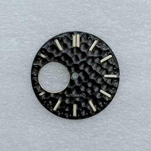 28,5 mm bikakebearbetad hamrad urtavla för NH38 NH70 skeletturverk Modifierade delar Applicerade index Flera färger Gör-det-själv-anpassad urtavla reparation black gold