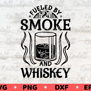 May include: Black and white graphic design with the text "Fueled by Smoke and Whiskey". The design features a glass of whiskey with ice cubes and a stylized flame design.