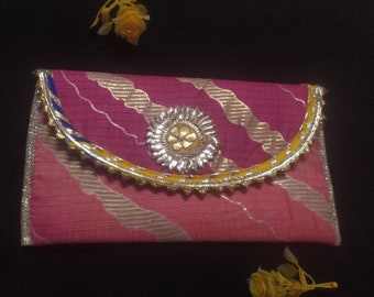 This Is Indian Multi Colour Pink Yellow And Gold Colour Decorative Handmade Applique Work Design Purse For Special Occasion Wholesalers