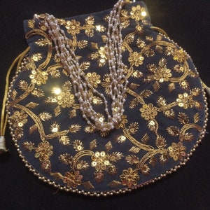 This Is Indian Gold And Grey Colour Decorative Handmade Sequin Design Beaded Chain Potli Purse For Special Occasion Wedding Gift