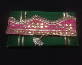 This Is Indian Multi Colour Green Pink  And Gold Colour Decorative Handmade Work Tassels Design Purse For Special Occasion Wholesalers