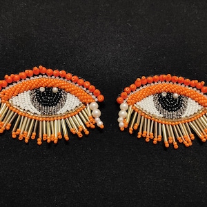 Indian Orange Black White Multi Colour Eye Design Beaded Work Pipe Tassels Patch Applique Used in Different Designing in Multi Artifacts